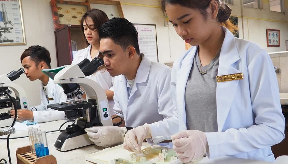 Filipino STEM students working in a laboratory